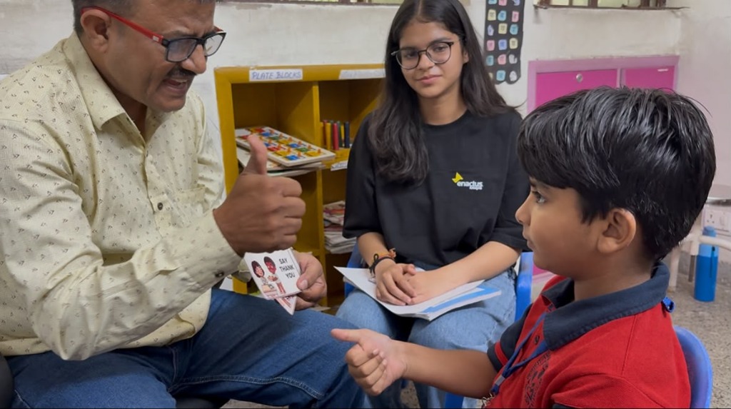 Enactus Ramjas Volunteer and Educator conducting sensory empathy session with child for Project Anubhava